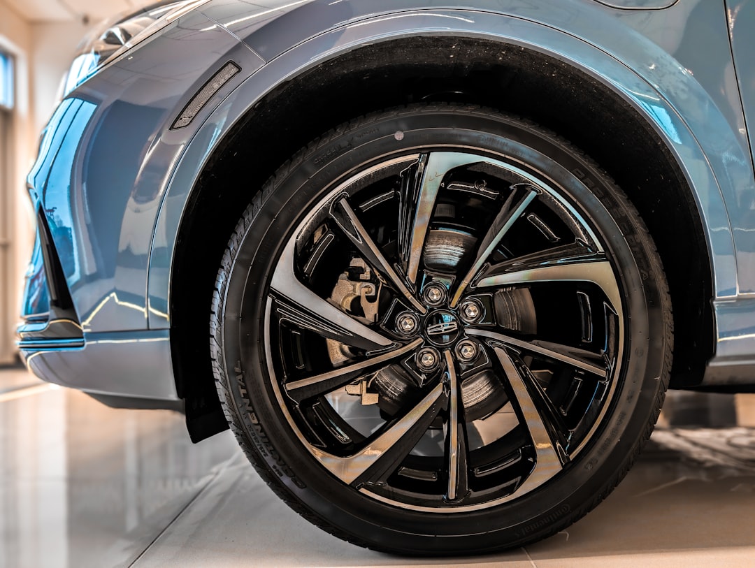 close-up-of-a-shiny-car-wheel-and-tire-uviixpm3cqm